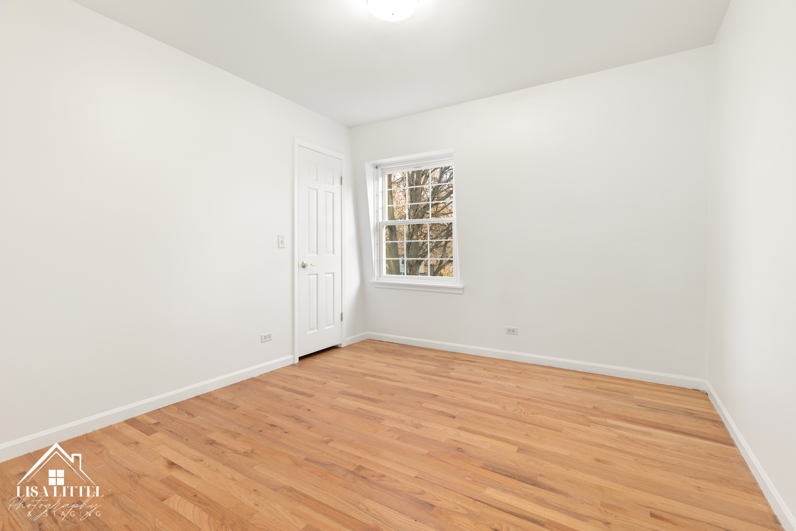6S230 Concord Road Naperville, IL 60540 - Photo 32 of 42 an empty room with wooden floor and windows