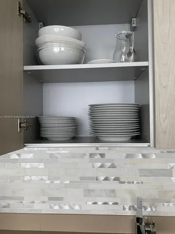 a view of closet with chair