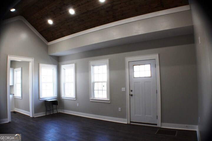 1007 Burch Street Cadwell, GA 31009 - Photo 24 of 25 an empty room with wooden floor and windows