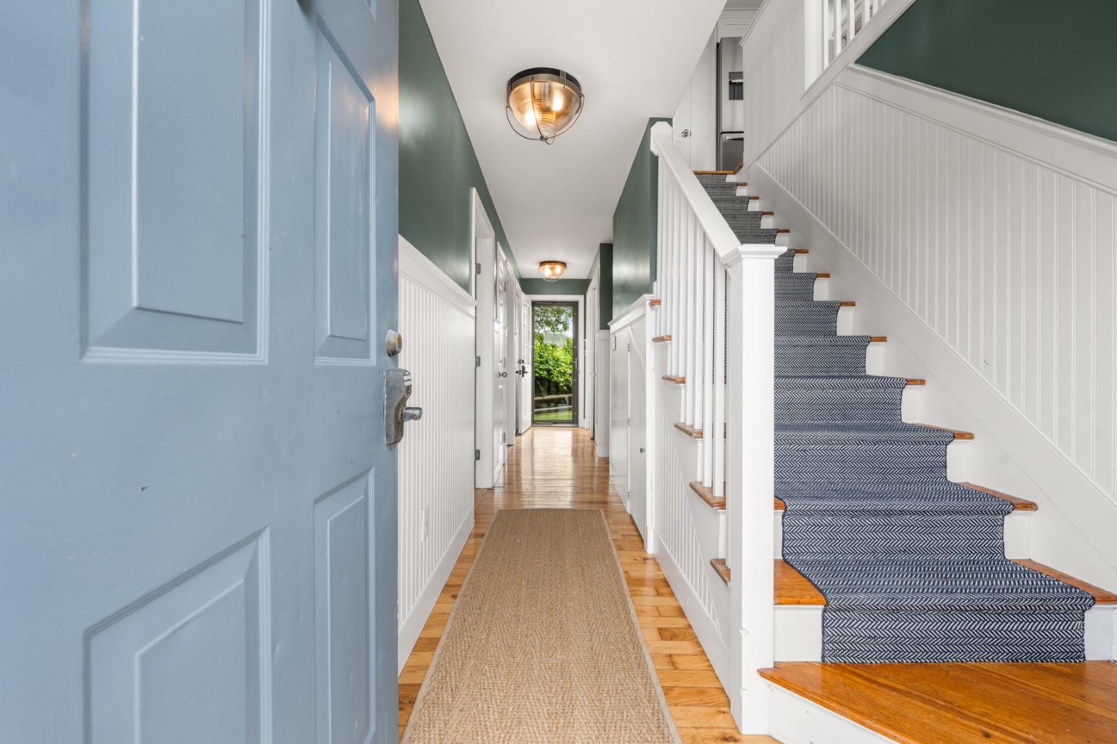 4 Berkley Street Nantucket, MA 02554 - Photo 24 of 47 a view of a hallway with wooden floor and entryway