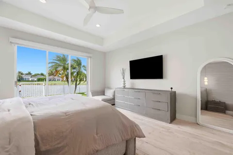 a bedroom with a bed and a cabinets