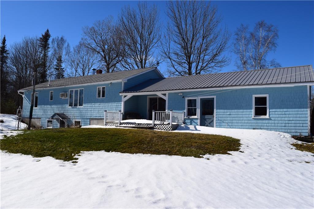 64 North Searsport Road Prospect, ME 04981 - Photo 3 of 19 Deck overlooks large backyard with...