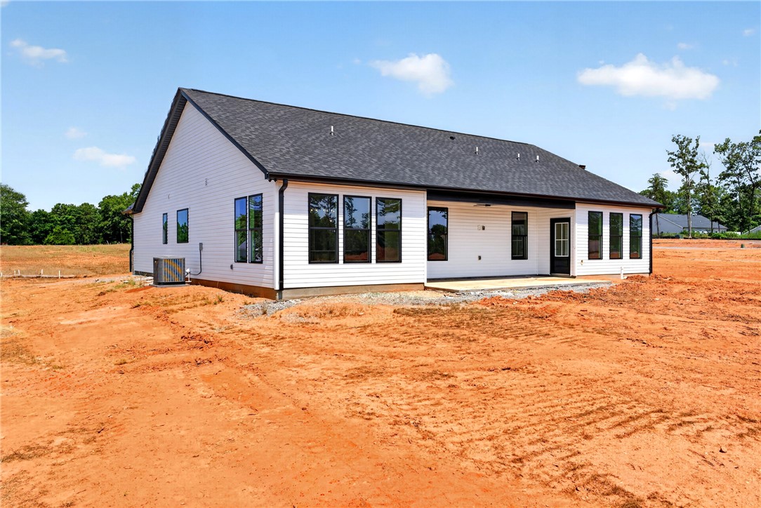 416 Blume Road Anderson, SC 29625 - Photo 26 of 29 A new construction home with modern black-trimmed windows and a vast backyard awaiting your personal touch.