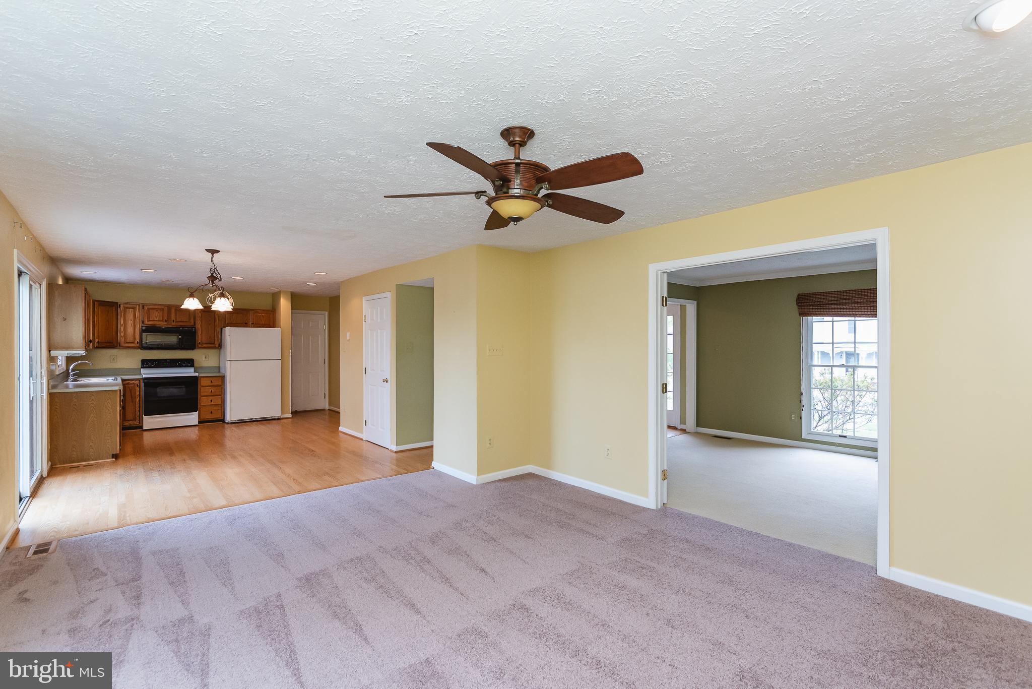 9202 Bretton Reef Road Baltimore, MD 21234 - Photo 18 of 54 Open the french doors to the living room