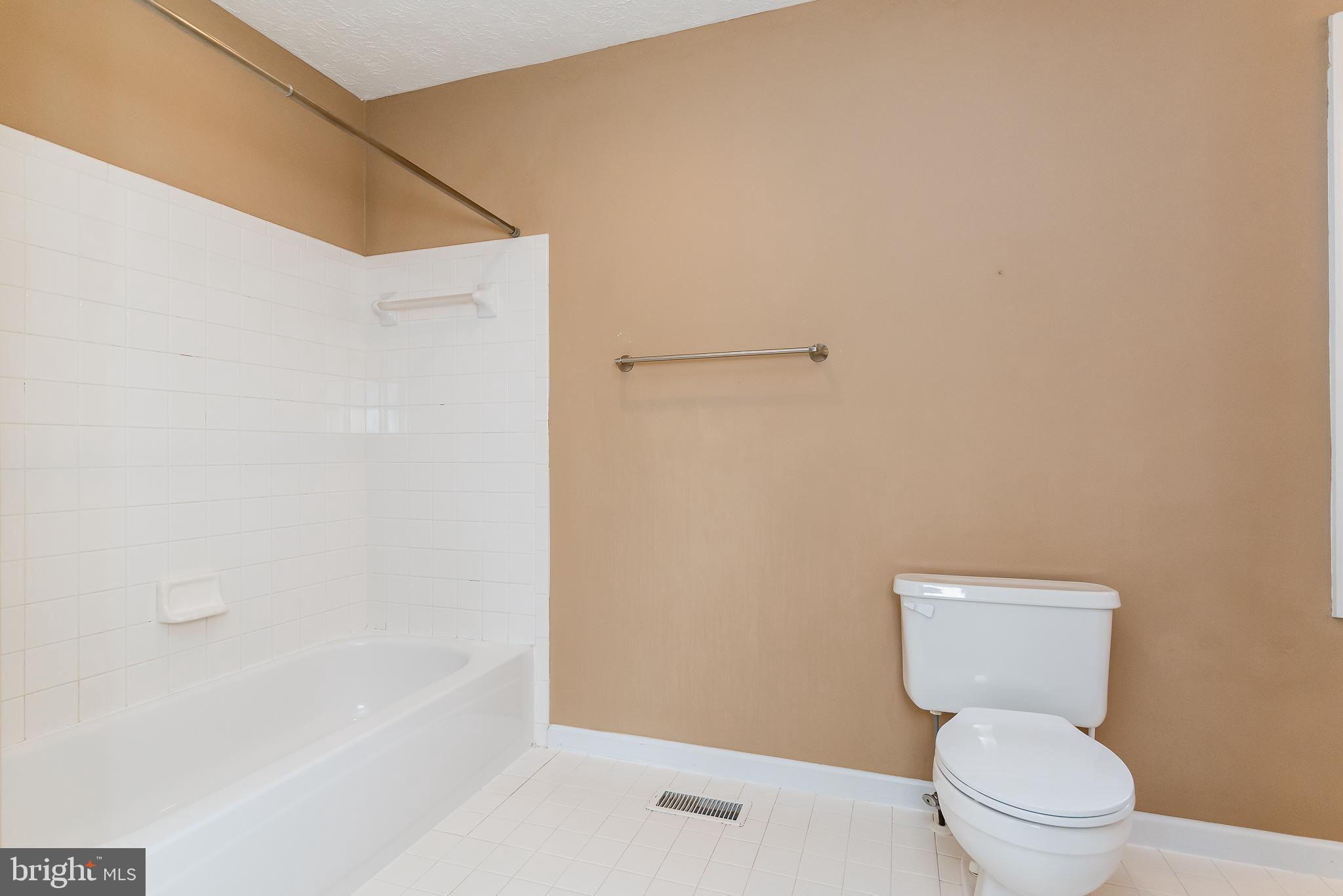 9202 Bretton Reef Road Baltimore, MD 21234 - Photo 29 of 54 Ceramic tub surround and floors