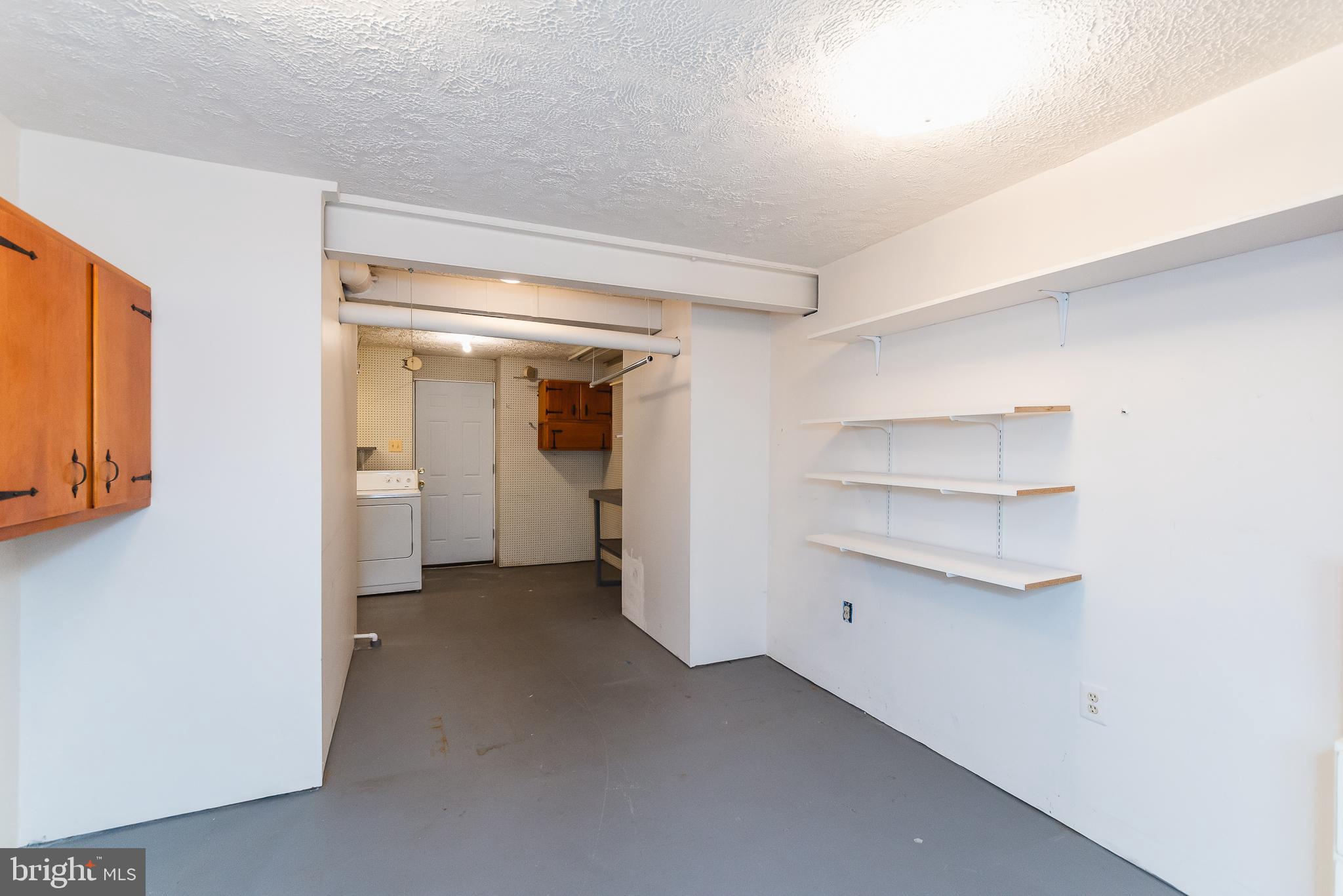 9202 Bretton Reef Road Baltimore, MD 21234 - Photo 43 of 54 Lots of additional storage space in the basement