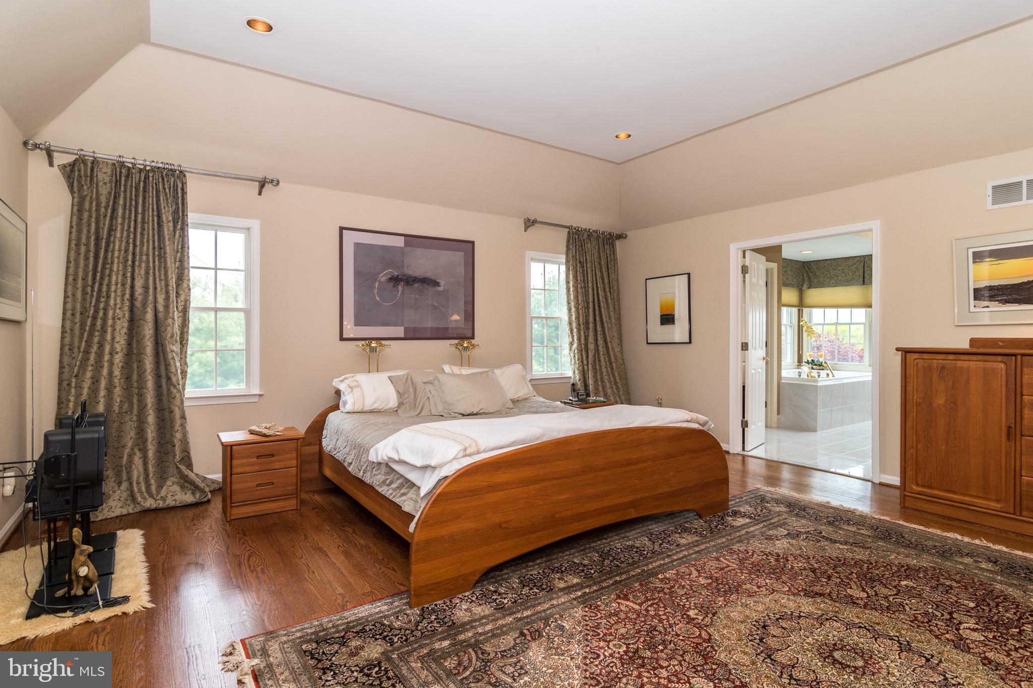 4548 Ridgetop Road Doylestown, PA 18902 - Photo 24 of 41 Master bedroom with tray ceiling and wood floors