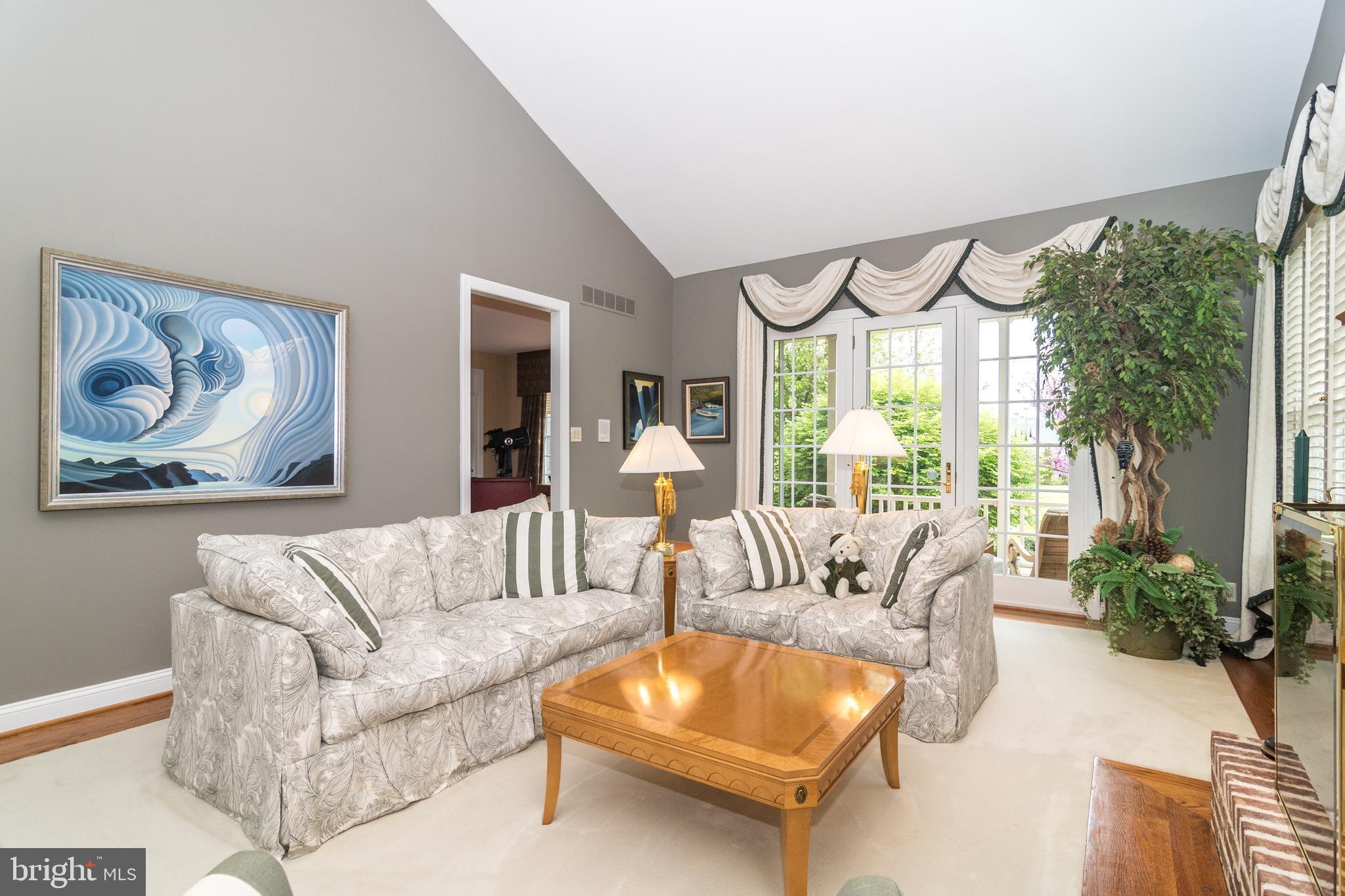 4548 Ridgetop Road Doylestown, PA 18902 - Photo 8 of 41 Cathedral ceiling and doors to private patio