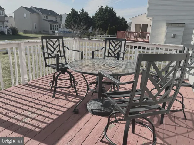 a view of a chairs and table on the terrace