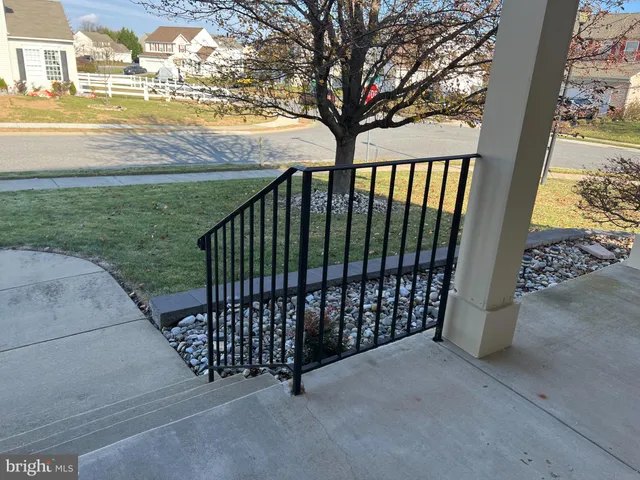 a view of a backyard from a corridor