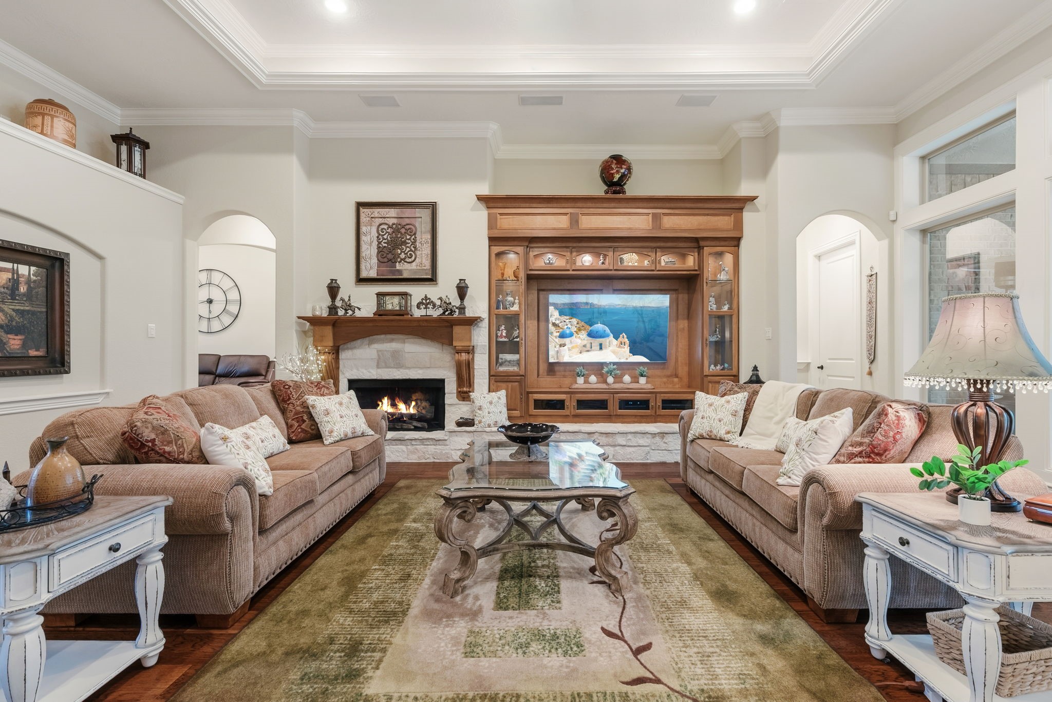 28502 Crawford Ridge Court Huffman, TX 77336 - Photo 11 of 50 a living room with furniture and a fireplace