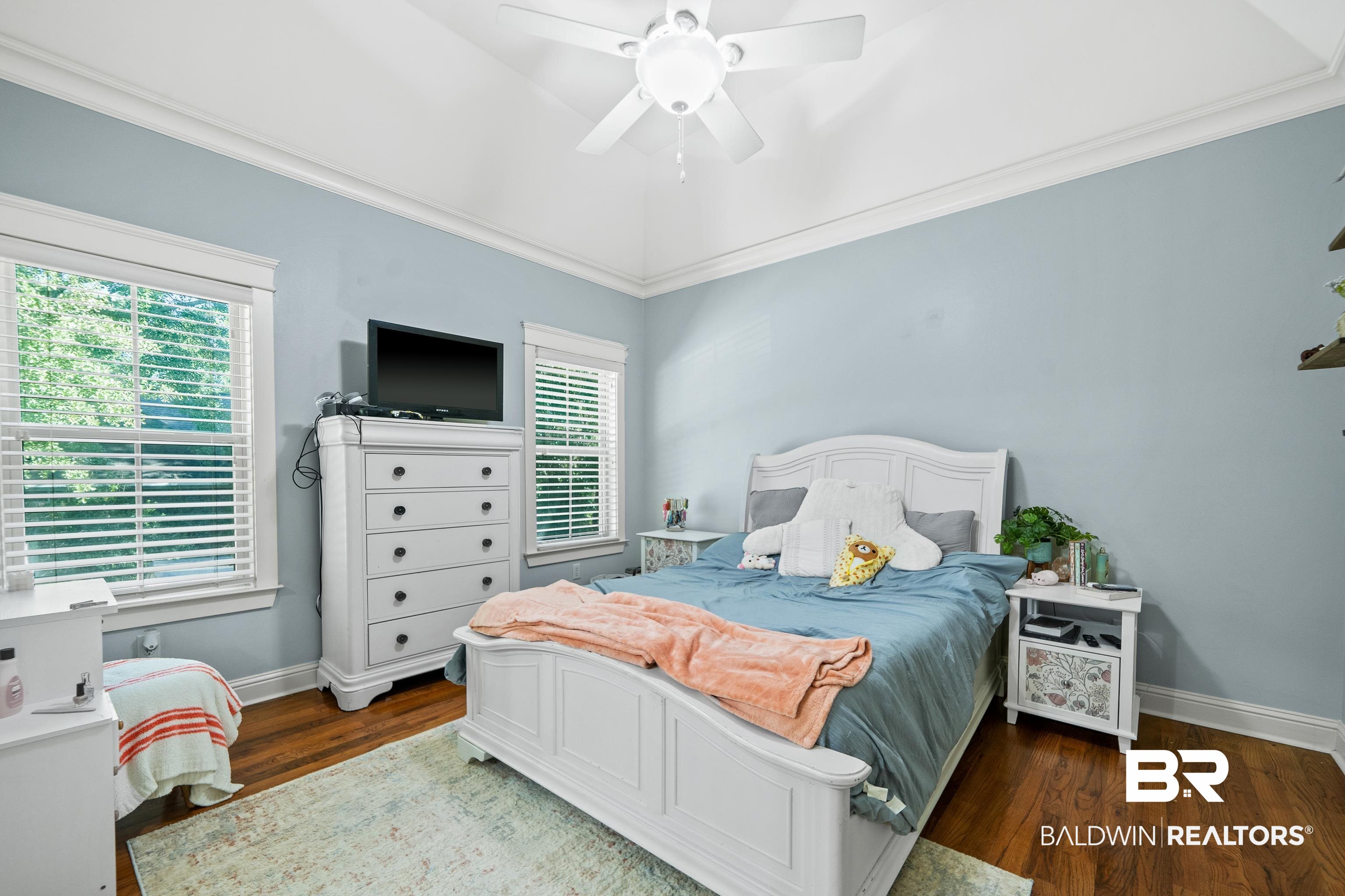 31829 Butler Drive Daphne, AL 36527 - Photo 31 of 48 Bedroom featuring ornamental molding, ceiling fan, and dark hardwood / wood-style floors