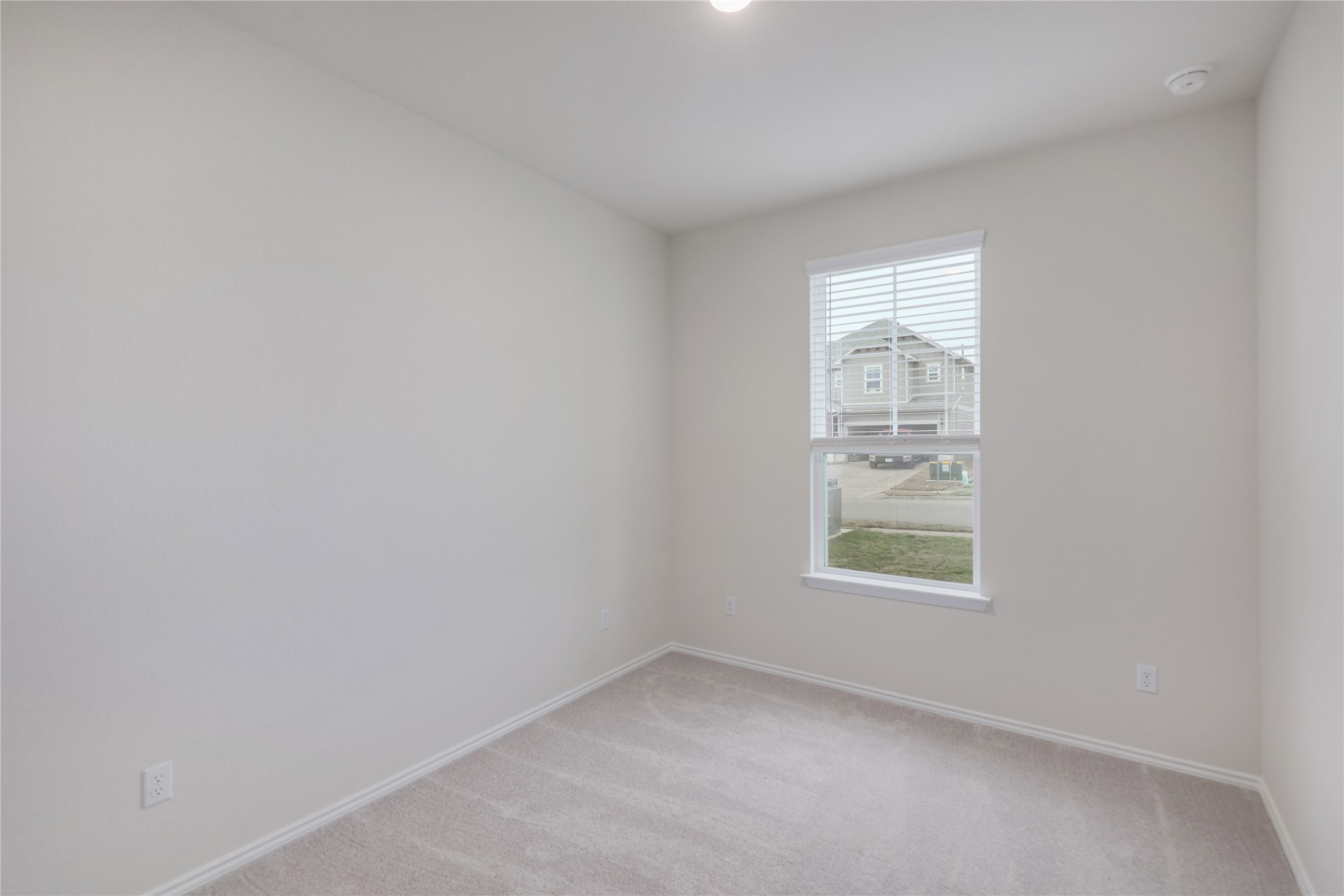212 Sugar Cane Road Buda, TX 78610 - Photo 14 of 40 Downstairs you'll find an additional bedroom or home office.