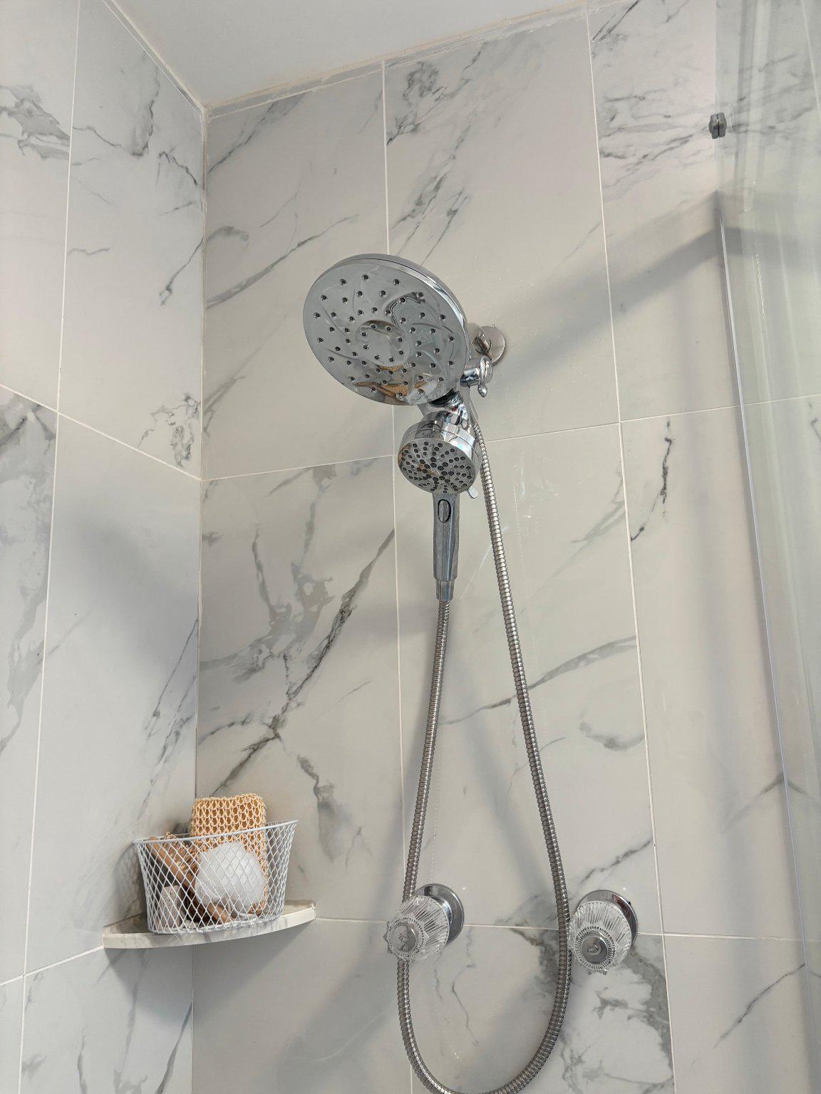 608 6th Place Southwest Washington, DC 20024 - Photo 47 of 65 Sleek shower with elegant marble tiles.