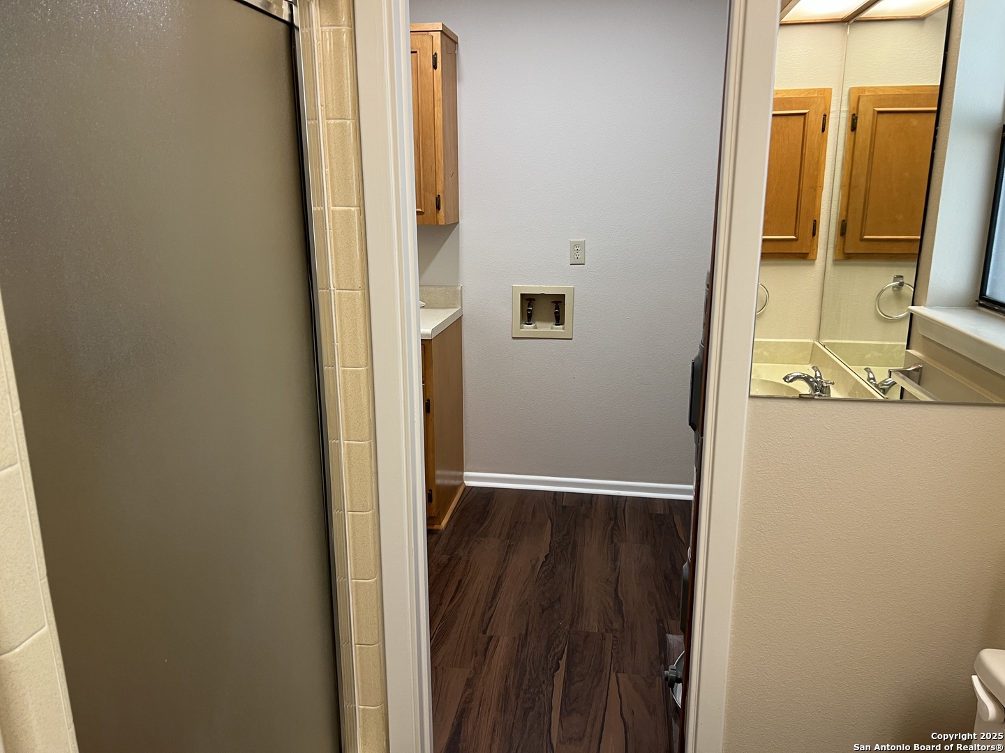 624 East Elm Street, Unit 1 Seguin, TX 78155 - Photo 14 of 19 hallway with wooden floor