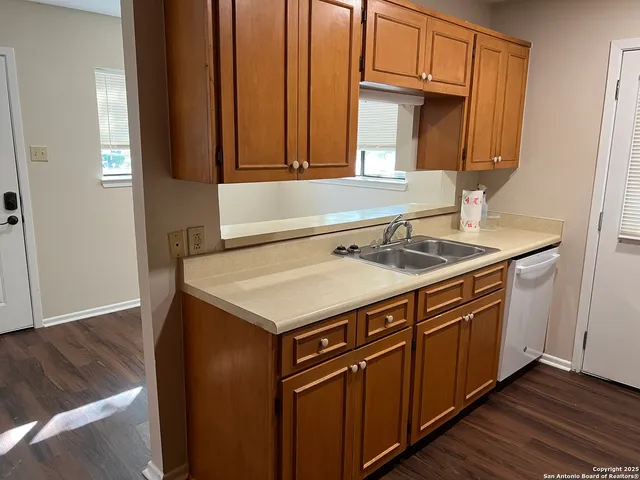 a utility room with washer and dryer