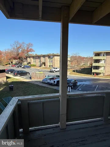 a view of a balcony with an ocean view
