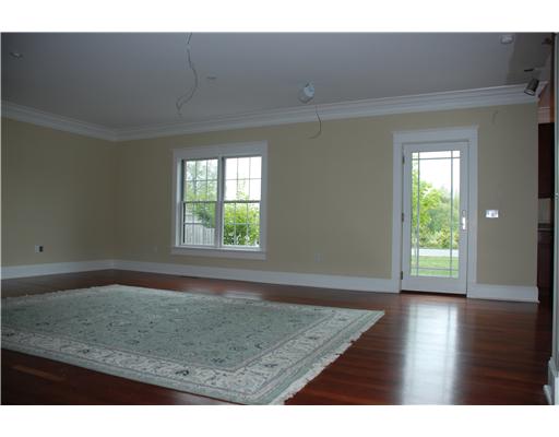 53 Sandy Point Farm Road, Unit 6 Portsmouth, RI 02871 - Photo 5 of 9 Exterior Front. Open living and dining area.