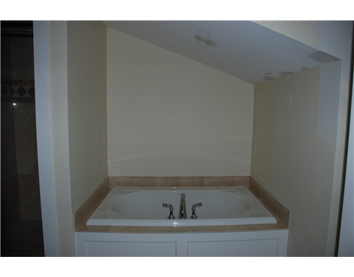 53 Sandy Point Farm Road, Unit 6 Portsmouth, RI 02871 - Photo 7 of 9 Exterior Front. Soak tub in Master Bath.