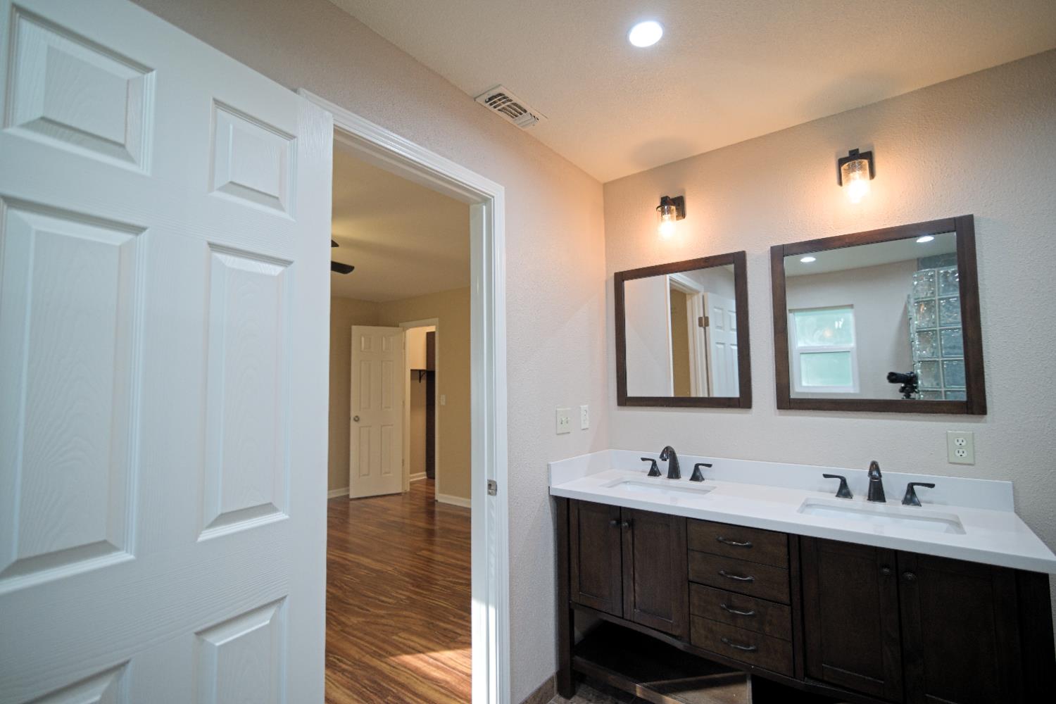 33072 Black Mountain Road Tollhouse, CA 93667 - Photo 22 of 45 a bathroom with 2 sink and a mirror