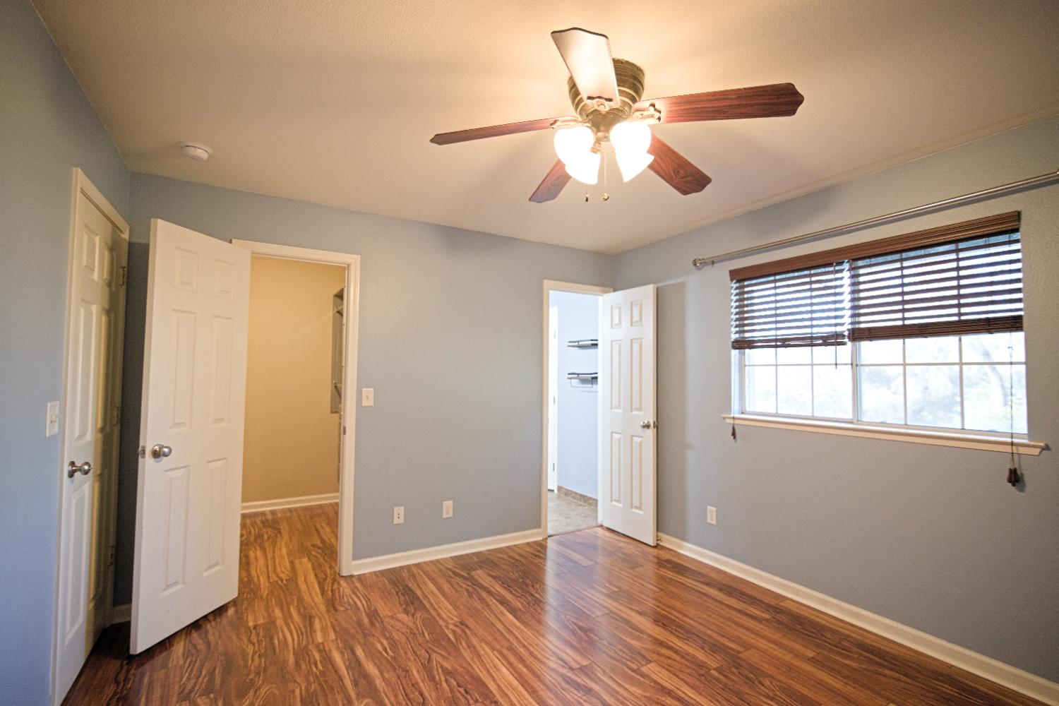 33072 Black Mountain Road Tollhouse, CA 93667 - Photo 31 of 45 a view of an empty room with wooden floor and a window