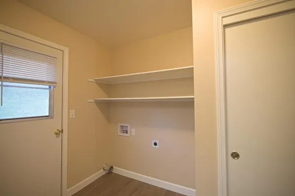 a bathroom with 2 sink and a mirror