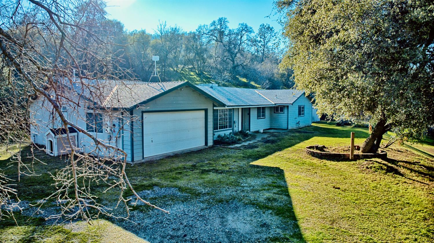 33072 Black Mountain Road Tollhouse, CA 93667 - Photo 4 of 45 a front view of a house with yard porch and green space