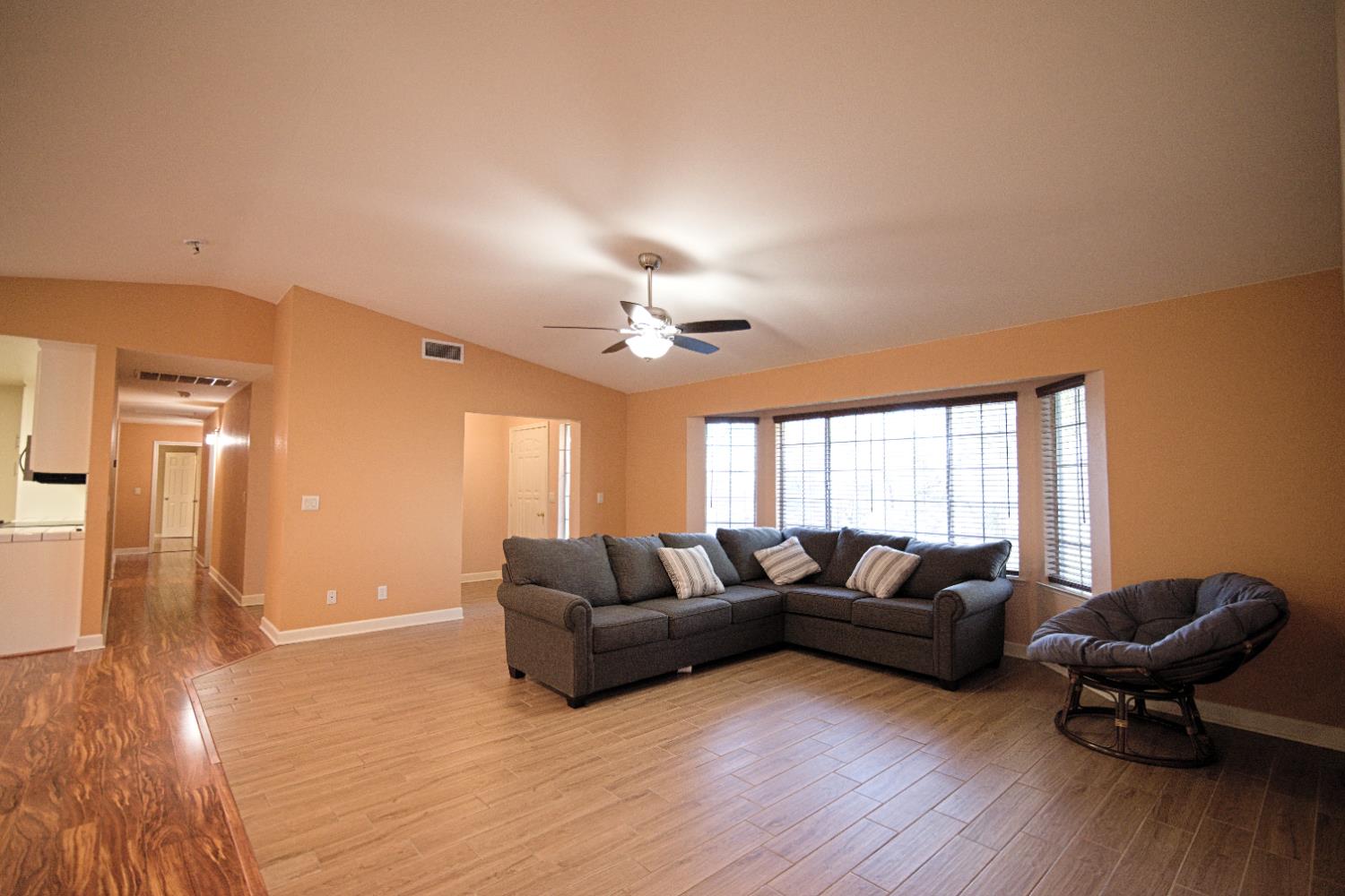 33072 Black Mountain Road Tollhouse, CA 93667 - Photo 9 of 45 a living room with furniture and a chandelier