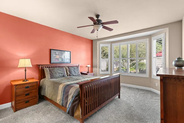 a bathroom with a sink double vanity and a mirror