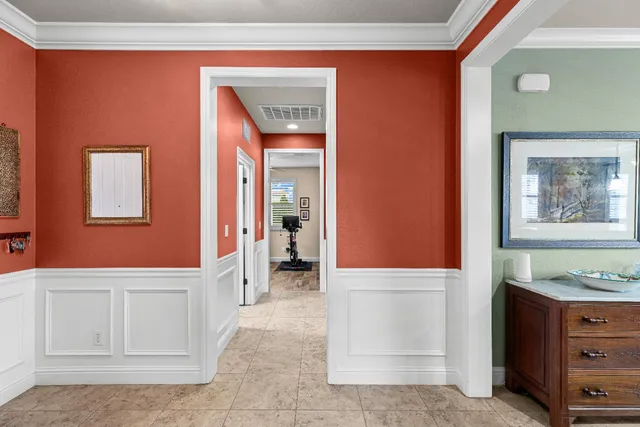 a view of a house with backyard sitting area and furniture