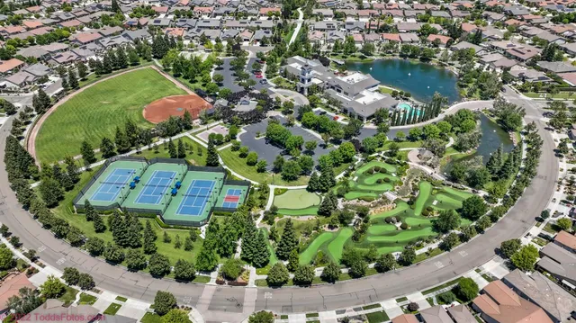 a view of a garden with a lake view