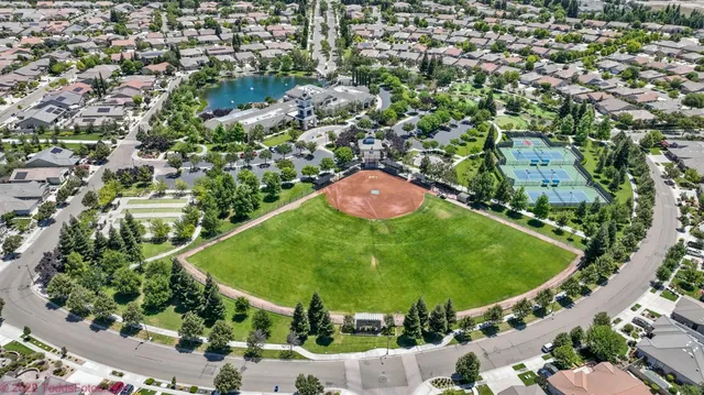 a view of a golf course with a yard