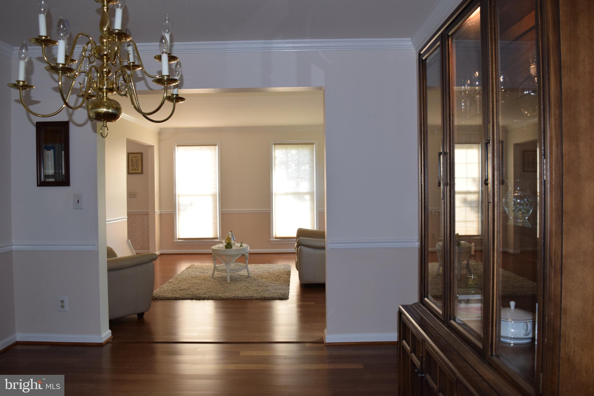 8198 Barnwood Road Manassas, VA 20110 - Photo 13 of 48 Spacious Formal Dining for Elegant Entertaining