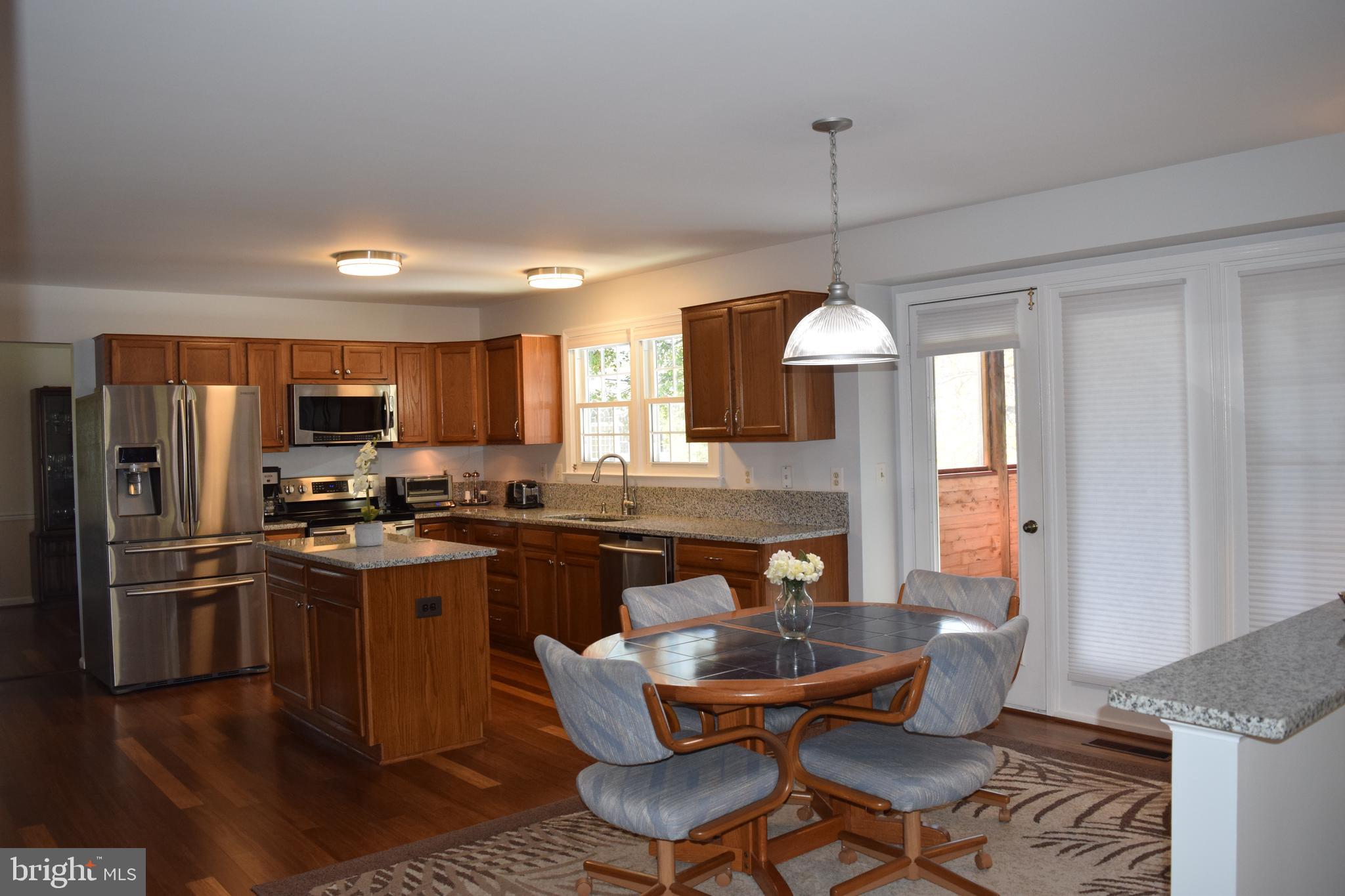 8198 Barnwood Road Manassas, VA 20110 - Photo 20 of 48 Breakfast Room with French Doors to Screen Porch