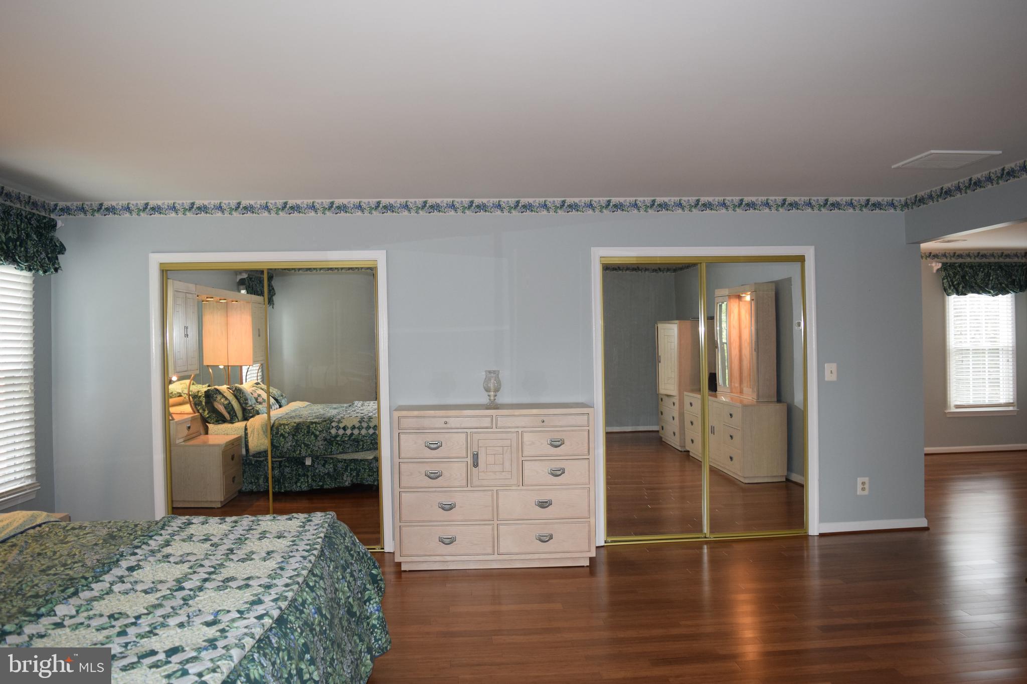 8198 Barnwood Road Manassas, VA 20110 - Photo 26 of 48 Master Bedroom with 4 Spacious Closets