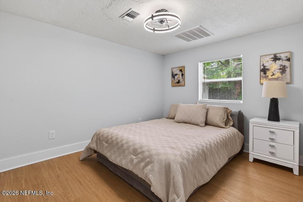 43739 Ratliff Road Callahan, FL 32011 - Photo 39 of 55 a bedroom with a bed and a window