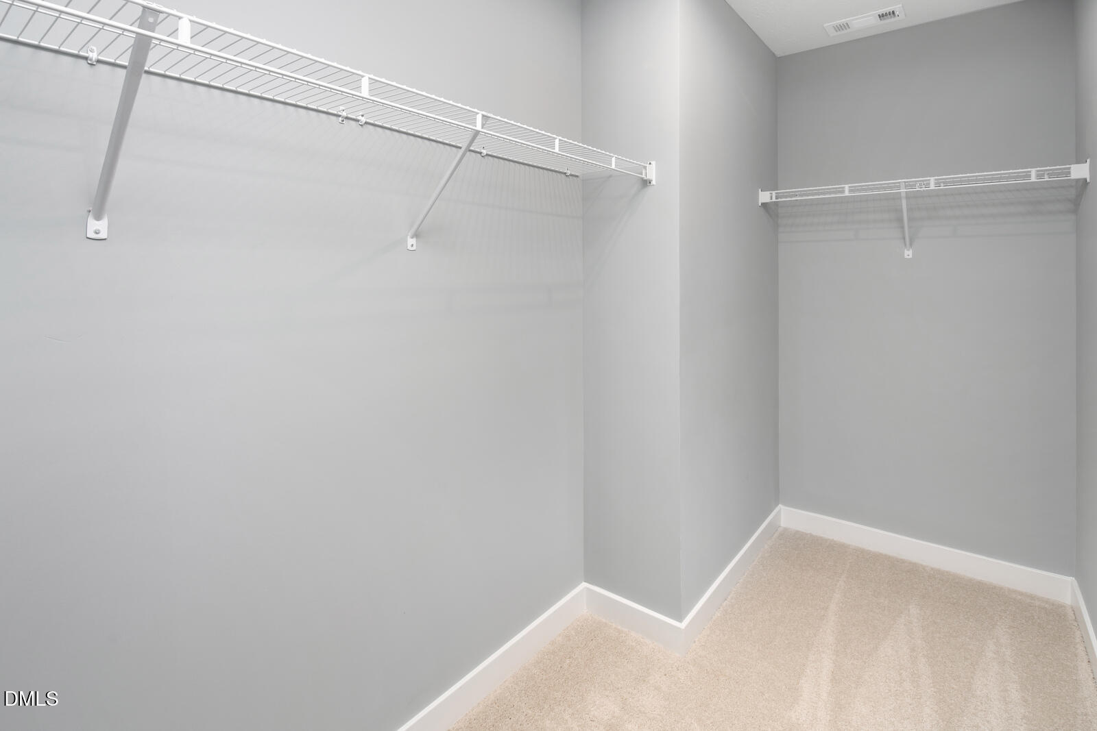 264 Matthiola Drive Wendell, NC 27591 - Photo 21 of 33 a view of a room with racks on the wall