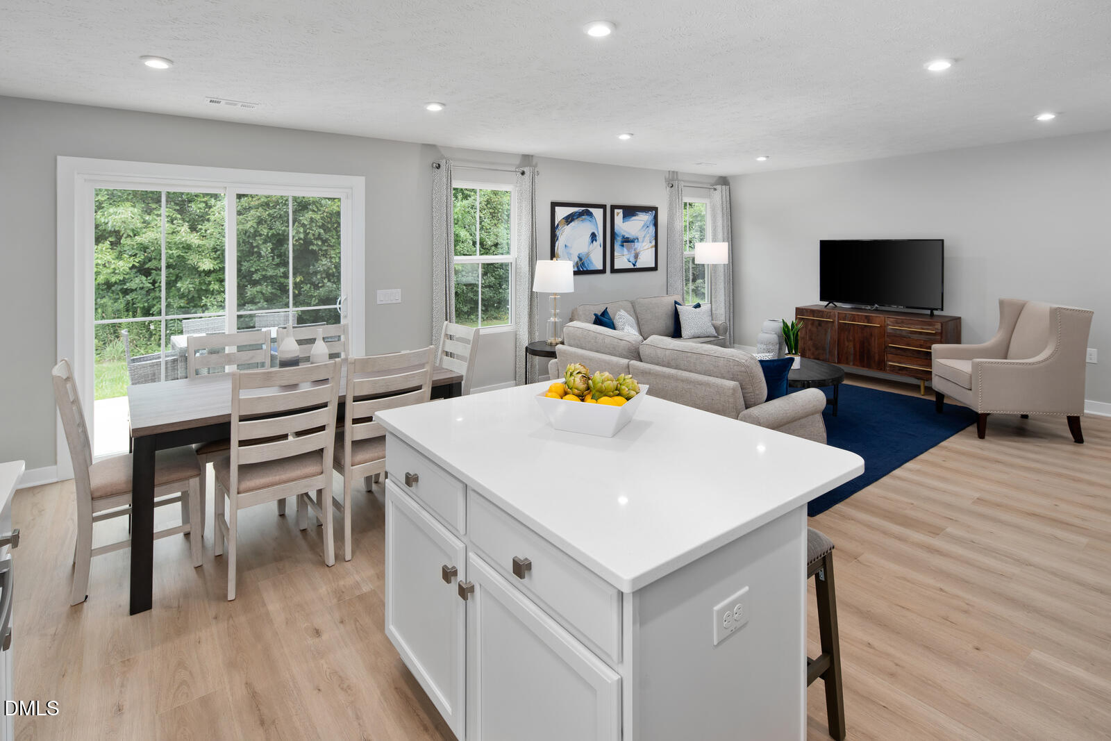264 Matthiola Drive Wendell, NC 27591 - Photo 7 of 33 a view of a dining room with furniture and wooden floor