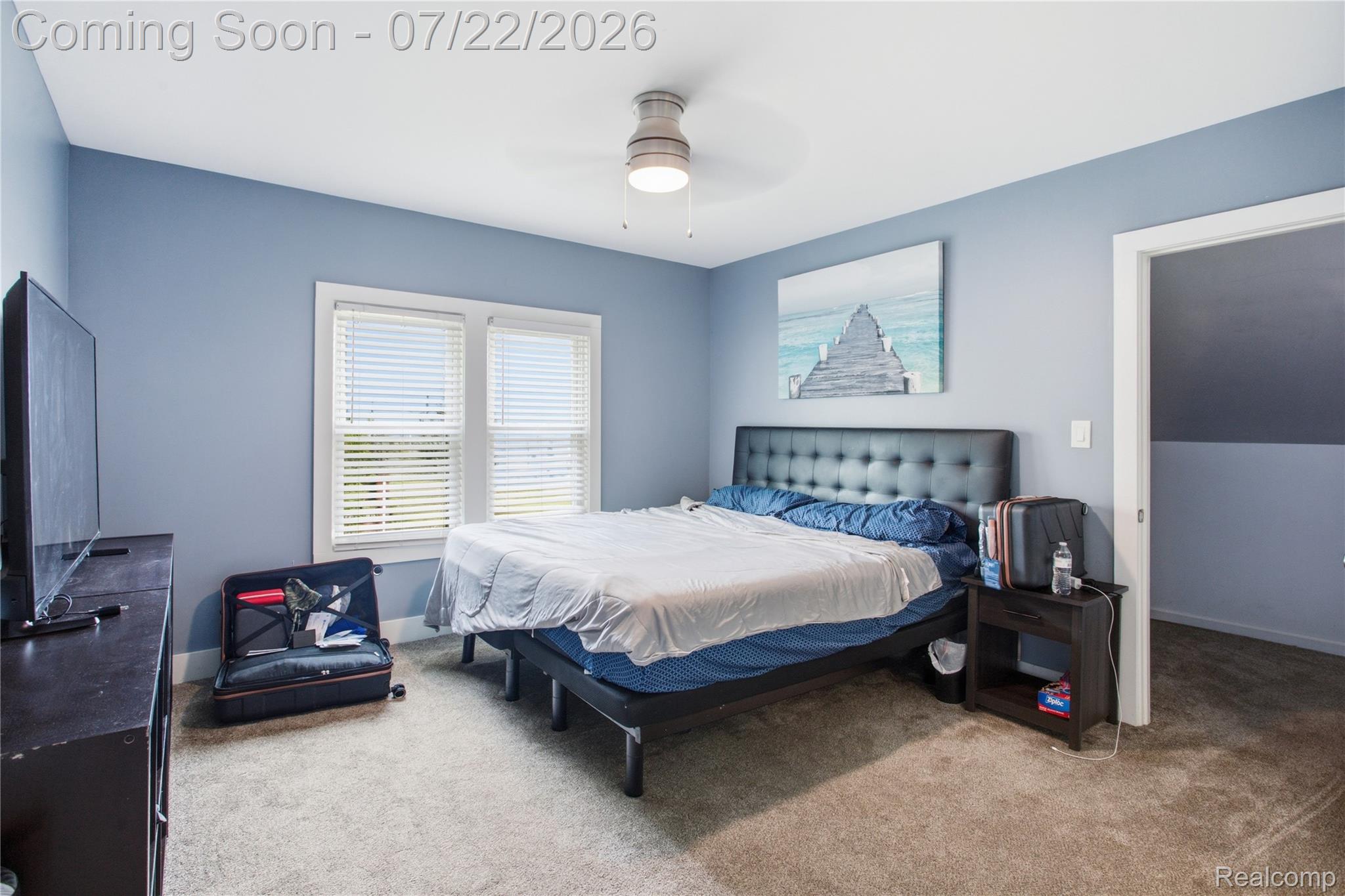 32127 Utica Road Fraser, MI 48026 - Photo 20 of 43 Carpeted room with light blue walls and a white ceiling