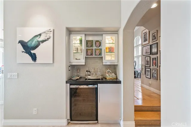 a spacious bedroom with a bed and a couch