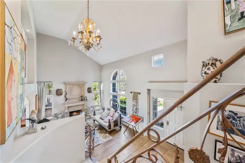a spacious bedroom with a bed window and a table