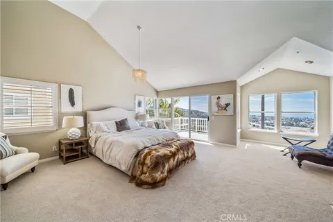 a bed room with a bed and a couch