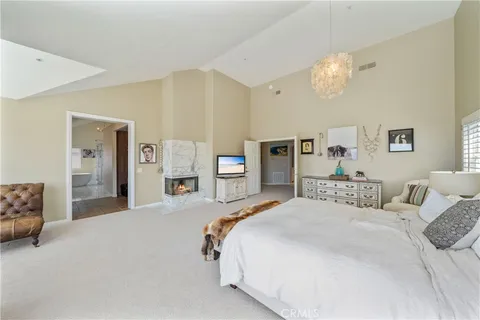 a view of a patio with couches and potted plants