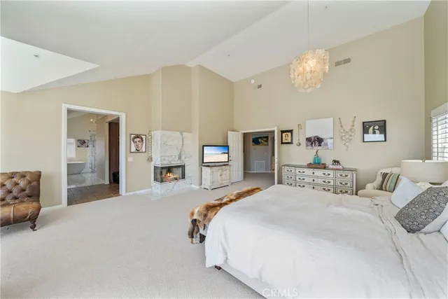 a view of a patio with couches and potted plants