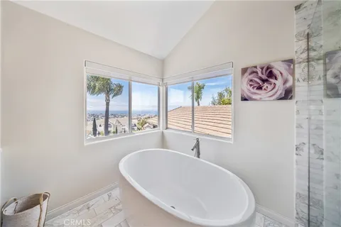 a view of house with yard outdoor seating and entertaining space