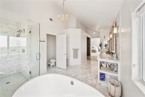 a view of an house with swimming pool garden and patio