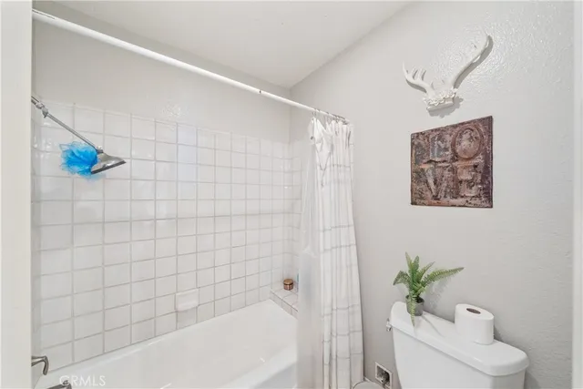 a view of a city with a building in the background