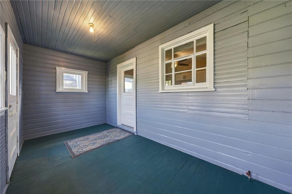 503 Standard Avenue Springdale, PA 15144 - Photo 24 of 31 enclosed unheated porch with gas line and laundry room potential