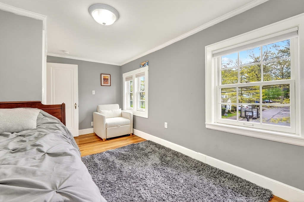 87 Payson Road Brookline, MA 02467 - Photo 29 of 41 a bedroom with a bed and a window