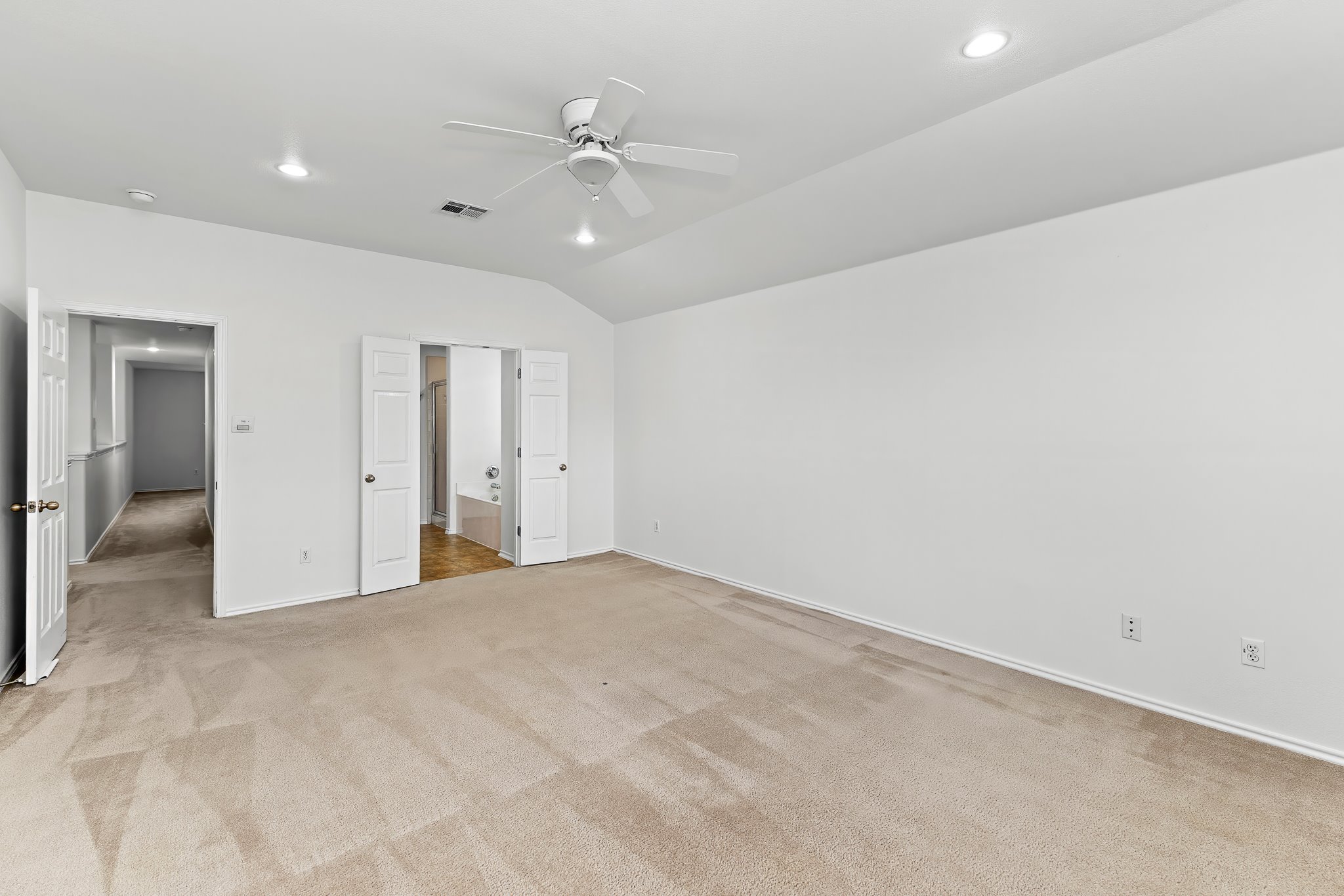 6700 Tulloch Way Austin, TX 78754 - Photo 26 of 39 a view of an empty room with a ceiling fan